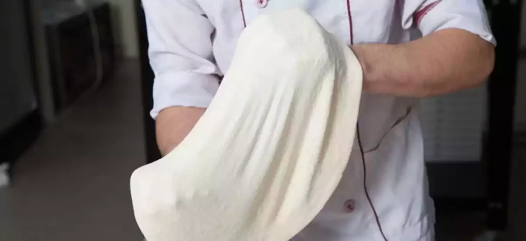 how to stretch pizza dough
